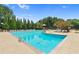 Large community swimming pool with plenty of lounge chairs for residents to enjoy at 3675 Ridgeway Ter, Suwanee, GA 30024