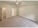 Spacious bedroom featuring neutral decor, ample natural light, and ensuite bathroom access at 46 Timber Walk Dr, Sharpsburg, GA 30277