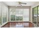 Bright living room featuring gleaming hardwood floors and an abundance of natural light at 1362 Brockett Pl, Clarkston, GA 30021