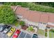 An aerial view shows well-maintained townhome exteriors with ample parking at 1810 Ashborough Se Rd # G, Marietta, GA 30067