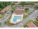 Aerial view of the community pool and clubhouse area, showcasing well-maintained facilities and ample parking at 1810 Ashborough Se Rd # G, Marietta, GA 30067
