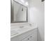 Bathroom features a white vanity with a sink and a large framed mirror at 1810 Ashborough Se Rd # G, Marietta, GA 30067