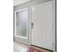 A well-lit front entryway features a secure white door with a digital lock and tiled flooring at 1810 Ashborough Se Rd # G, Marietta, GA 30067
