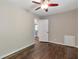 Neutral bedroom with hardwood floors, fan, and closet at 2002 Shalimar Ne Dr, Chamblee, GA 30345