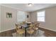 Dining room with hardwood floors, natural light and seating for six at 2002 Shalimar Ne Dr, Chamblee, GA 30345