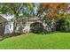 Charming home with inviting front porch, manicured lawn, and mature landscaping at 2002 Shalimar Ne Dr, Chamblee, GA 30345