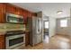 Functional kitchen layout with updated appliances and ample counter space at 2002 Shalimar Ne Dr, Chamblee, GA 30345