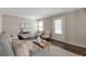 Bright living room with neutral tones, hardwood floors, and stylish decor at 2002 Shalimar Ne Dr, Chamblee, GA 30345