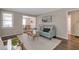Comfortable living room with hardwood floors and dining room view at 2002 Shalimar Ne Dr, Chamblee, GA 30345