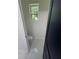 Bright bathroom featuring a window, toilet, and marble tile floor at 2588 Abner Nw Pl, Atlanta, GA 30318