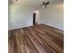 Bedroom featuring hardwood floors, ceiling fan, neutral colors and ample natural light at 2588 Abner Nw Pl, Atlanta, GA 30318