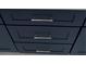 Close up of navy cabinets with sleek silver hardware at 2588 Abner Nw Pl, Atlanta, GA 30318