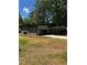 Well-kept home featuring modern design elements, a garage, and a beautifully landscaped yard at 2588 Abner Nw Pl, Atlanta, GA 30318