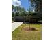 Charming single-story home with a modern design, well-manicured lawn, and ample curb appeal at 2588 Abner Nw Pl, Atlanta, GA 30318