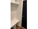 Mud room featuring white cubbies, bench, and door to outside at 2588 Abner Nw Pl, Atlanta, GA 30318
