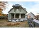 View of exterior covered patio area with outdoor seating and entertainment space at 50 Black Gum Lot 49 Ln, Auburn, GA 30011