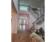 Grand foyer with high ceilings, hardwood floors, and a staircase leading to the upper level at 522 Blue Mountain, Canton, GA 30114