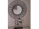 Hallway decor featuring a round mirror with metal accents and decorative art sculpture at 522 Blue Mountain, Canton, GA 30114
