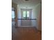 Upstairs landing with chair rail, window, and chandelier at 522 Blue Mountain, Canton, GA 30114
