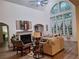 Bright living room featuring tall windows, hardwood floors, and comfortable seating at 522 Blue Mountain, Canton, GA 30114