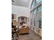 Bright living room featuring tall windows, hardwood floors, and comfortable seating at 522 Blue Mountain, Canton, GA 30114