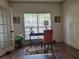 Cozy home office with natural light, desk and chair, ideal for remote work or study at 522 Blue Mountain, Canton, GA 30114