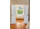 Bathroom featuring a soaking tub in front of a large window with natural light at 1219 Hadaway Ct, Lawrenceville, GA 30043