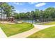 Community amenities including a playground, tennis court, and green spaces for outdoor activities at 1219 Hadaway Ct, Lawrenceville, GA 30043