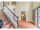 Welcoming foyer featuring high ceilings, hardwood floors, and an adjacent office space at 1219 Hadaway Ct, Lawrenceville, GA 30043