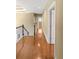 Inviting hallway with hardwood floors and natural light, connecting different areas of the home at 1219 Hadaway Ct, Lawrenceville, GA 30043
