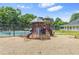 Community playground with a slide and play equipment, providing a fun and safe space for children at 1219 Hadaway Ct, Lawrenceville, GA 30043