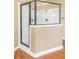 Walk-in shower with black trim and white tile at 1219 Hadaway Ct, Lawrenceville, GA 30043