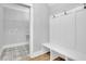 Mud room with bench, hooks, and patterned tile flooring at 153 Alaina Rd, Holly Springs, GA 30115