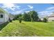 Expansive backyard featuring a lush green lawn, ideal for outdoor activities and relaxation at 196 Al Jennah Blvd, Locust Grove, GA 30248