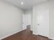Neutral bedroom with white doors and wood-look flooring at 196 Al Jennah Blvd, Locust Grove, GA 30248