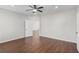 Large bedroom with wood floors and ceiling fan at 196 Al Jennah Blvd, Locust Grove, GA 30248