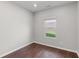 Bedroom features window with view of outside, and wood floors at 196 Al Jennah Blvd, Locust Grove, GA 30248
