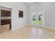 Cozy breakfast nook featuring ceramic tile flooring and views of the outdoors through glass-paned doors at 196 Al Jennah Blvd, Locust Grove, GA 30248