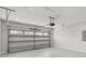 Spacious garage with a garage door and an automatic door opener at 196 Al Jennah Blvd, Locust Grove, GA 30248