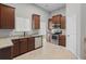 Bright kitchen with stainless steel appliances, granite countertops, and tiled floors at 196 Al Jennah Blvd, Locust Grove, GA 30248