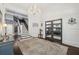 Stunning foyer with dark wood floors, a grand staircase, and elegant decor at 207 E Hightower E Trl, Social Circle, GA 30025