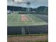 Well maintained outdoor track and field with the city skyline in the background at 207 E Hightower E Trl, Social Circle, GA 30025