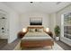 Bright bedroom with large window and streamlined bath; find comfort and convenience in this retreat at 2864 Parkway Close, Lithonia, GA 30058