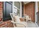 Quaint balcony with chairs, offering a cozy spot to relax and enjoy the view at 3502 Village Green Dr, Roswell, GA 30075