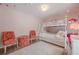 Charming ' bedroom featuring a bunk bed, a vanity desk, and soft pink accents at 3502 Village Green Dr, Roswell, GA 30075