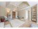 Contemporary bedroom with overhead lighting, access to attached bath, and light wood floors at 3502 Village Green Dr, Roswell, GA 30075