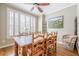 Elegant dining room with hardwood floors and natural light at 3502 Village Green Dr, Roswell, GA 30075