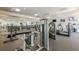 Well-equipped fitness center with treadmills, weights, and various machines, promoting a healthy lifestyle at 3502 Village Green Dr, Roswell, GA 30075