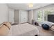 Serene bedroom featuring ample natural light, generous closet space, and a tranquil view, creating a peaceful retreat at 2362 Browns Mill Rd, Atlanta, GA 30315
