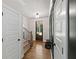 Inviting entryway featuring hardwood floors, custom millwork, and access to the staircase at 2362 Browns Mill Rd, Atlanta, GA 30315
